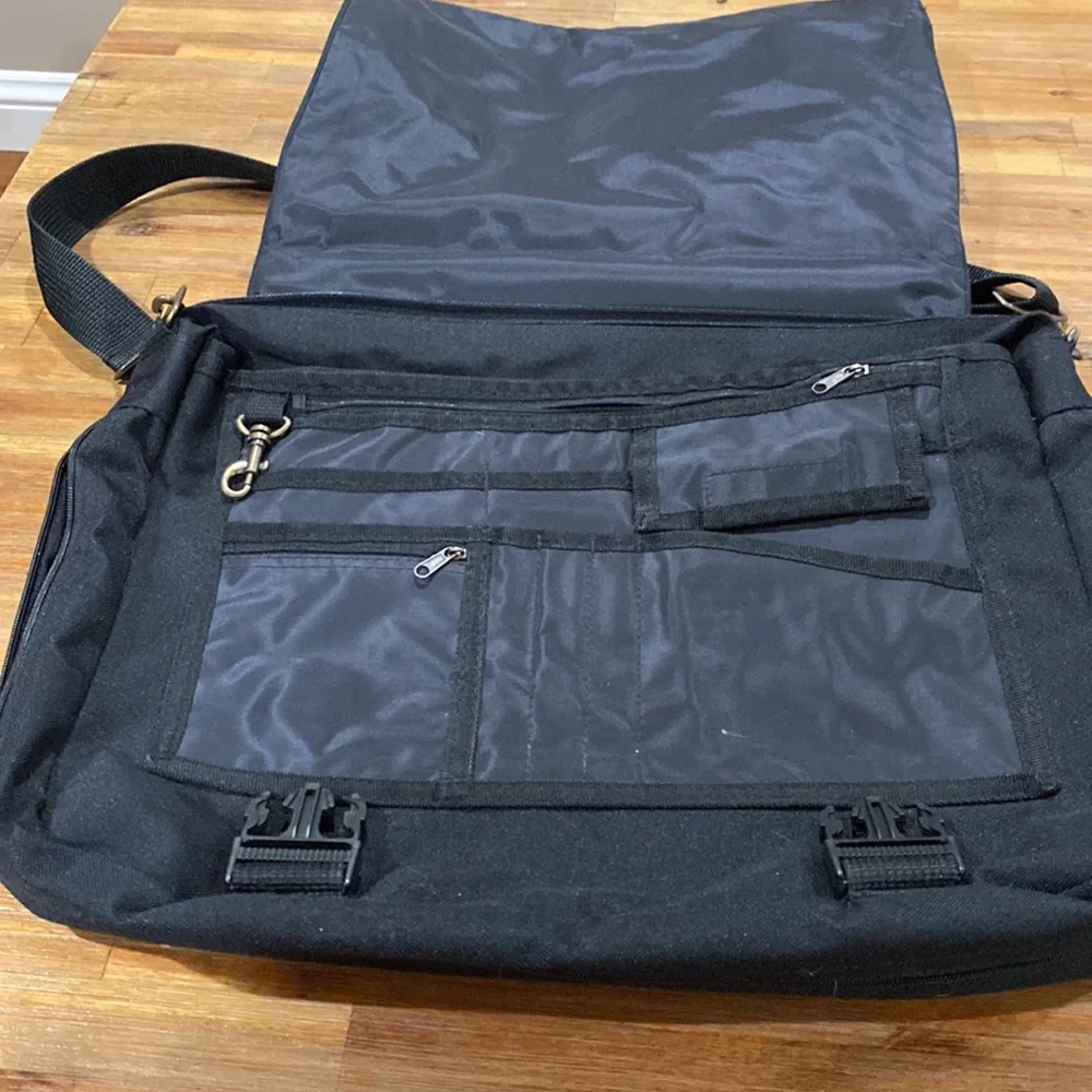 Black shoulder brief case bag with lots of pockets